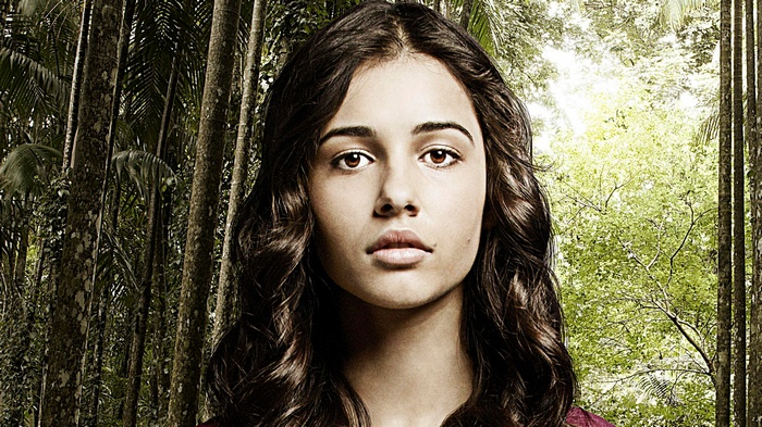 Naomi Scott in a forest