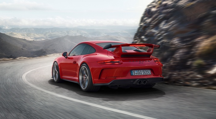 Red 2017 Porsche 911 GT3 on a mountain road