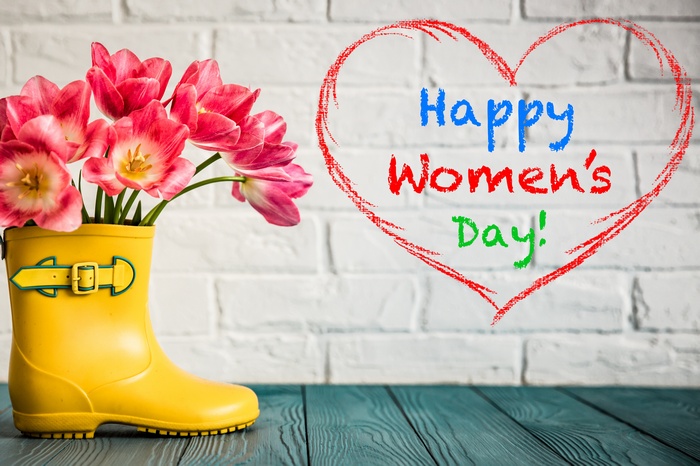 Happy Women's Day tulips in a yellow boot
