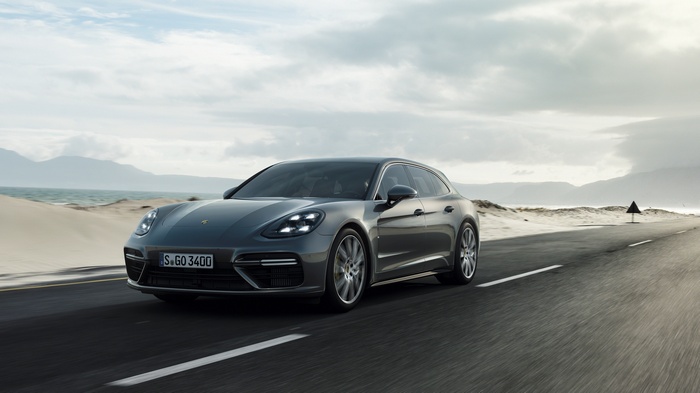 Porsche Panamera Turbo Sport Turismo driving on a coastal road