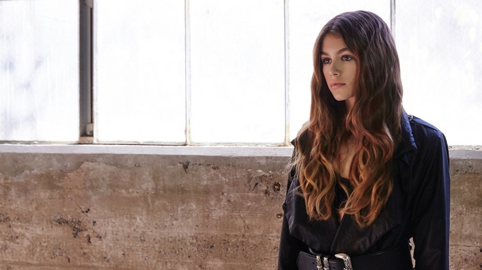 Kaia Gerber in a dark jacket
