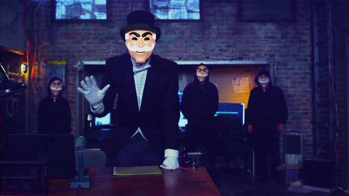 Mr. Robot characters wearing masks in a room