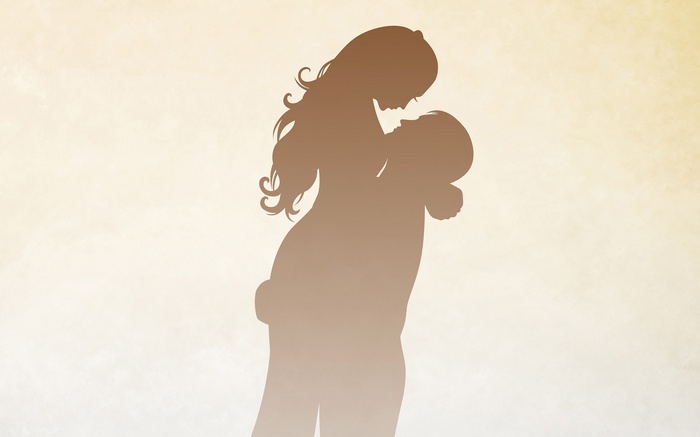 Silhouette of a couple embracing