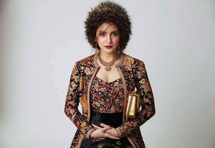 Anushka Sharma wearing a floral jacket and fur hat
