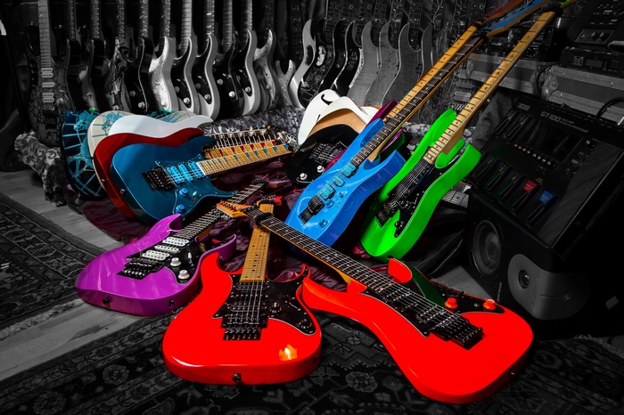 Collection of colorful electric guitars