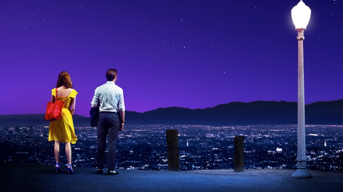 La La Land couple overlooking city at night