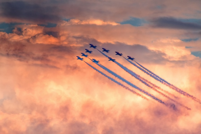 Air show with planes flying in formation