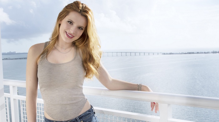 Bella Thorne on a Balcony Overlooking the Ocean