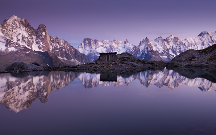 4K Mountains and Cabin Reflected in Lake