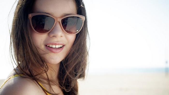 Hailee Steinfeld wearing sunglasses at the beach