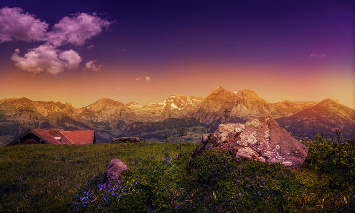 Mountains and a house in Wildhaus, Alps at evening, 4K