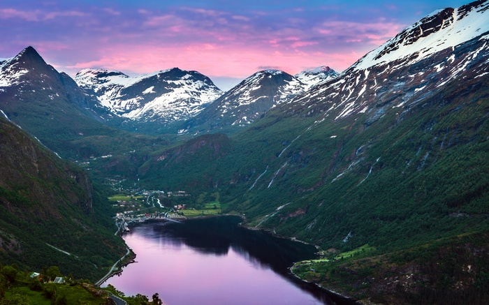 Geiranger Fjord Village with Snow-Capped Mountains in Norway