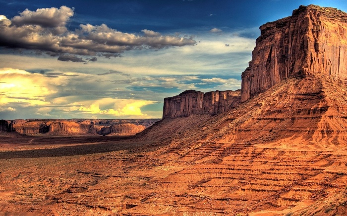 Monument Valley landscape with mesas and clouds