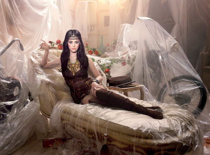 Katy Perry posing on a couch