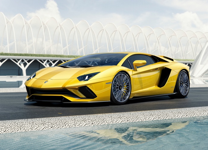 Yellow Lamborghini Aventador S on a road