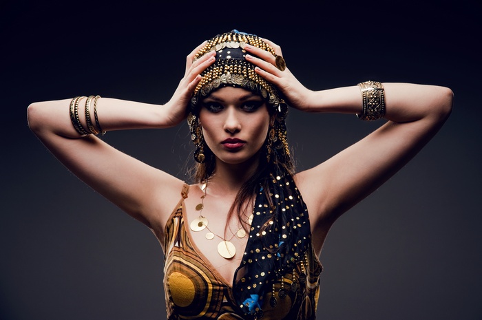 Woman in traditional Arab costume with jewelry