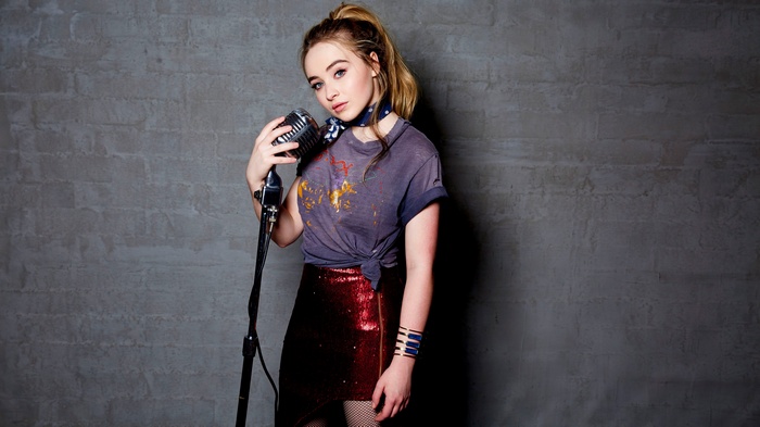 Sabrina Carpenter with microphone