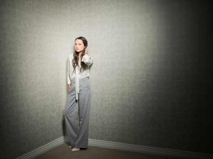 Alicia Vikander in a corner