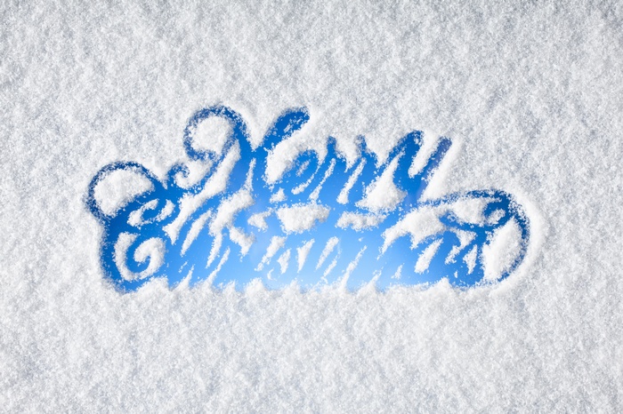 Merry Christmas written in snow