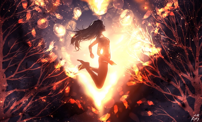 Girl jumping in a glowing forest