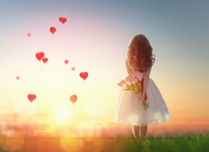 Girl with Tulips and Heart Balloons at Sunset