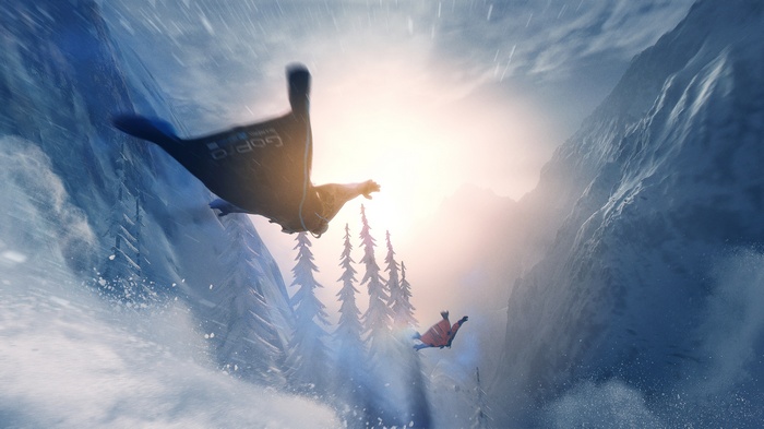 Wingsuit flying in snowy mountains