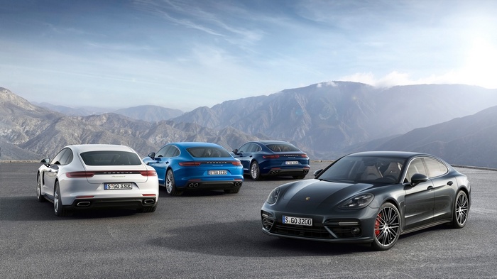 Porsche Panamera 4 E-Hybrid cars in mountains