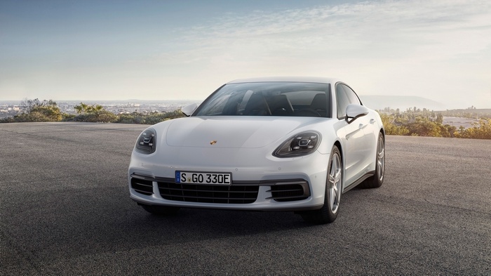 White Porsche Panamera 4 E-Hybrid parked outdoors