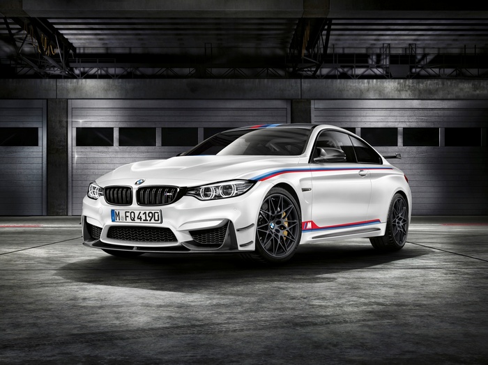 White BMW M4 DTM Champion Edition in a garage