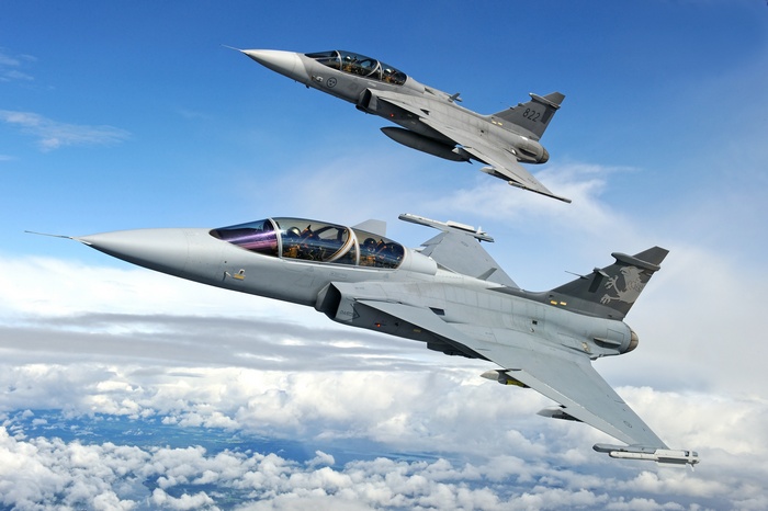 Two Saab JAS 39 Gripen fighter aircraft in flight