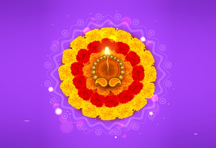 Diwali Flower Rangoli with Lit Diya