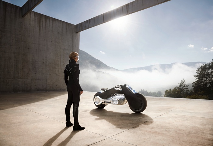 Woman and BMW Motorrad Vision Next 100 concept bike