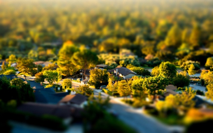 Aerial view of suburban neighborhood with houses and trees