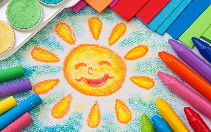 Children's Drawing of a Smiling Sun with Art Supplies