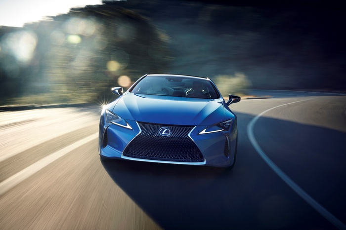 Blue Lexus LC 500h Coupe Driving on Road