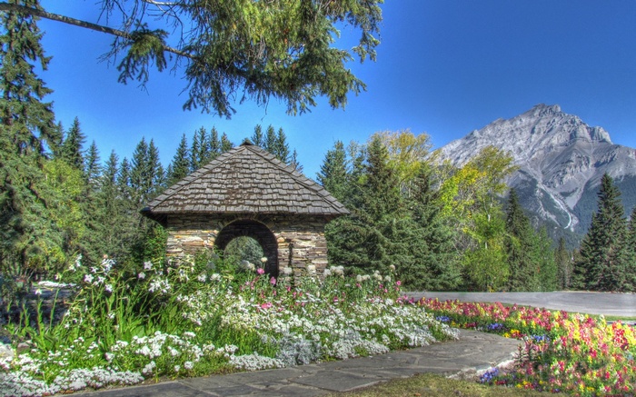 Stone Gazebo in a Garden with Mountains