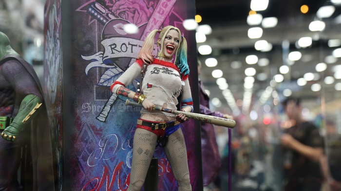 Harley Quinn action figure with baseball bat