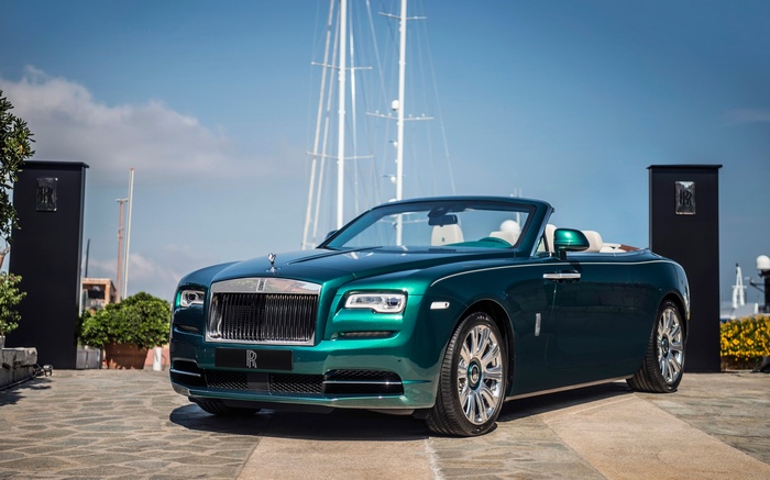 Green Rolls Royce Dawn Convertible in Porto Cervo
