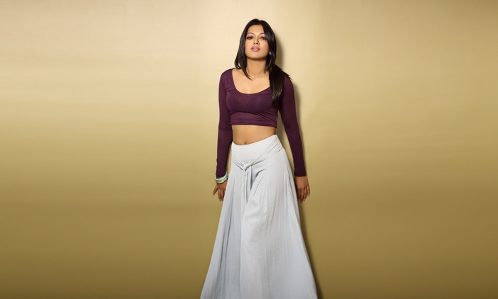 Catherine Tresa in maroon crop top and grey skirt
