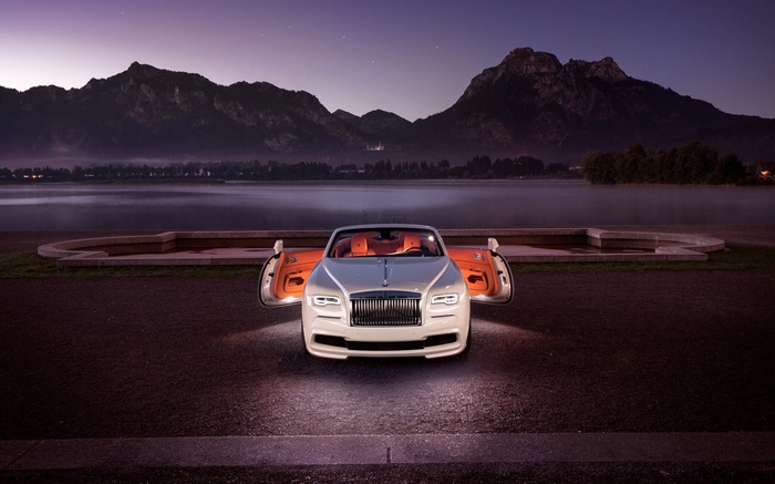 White Rolls Royce Dawn convertible with orange interior