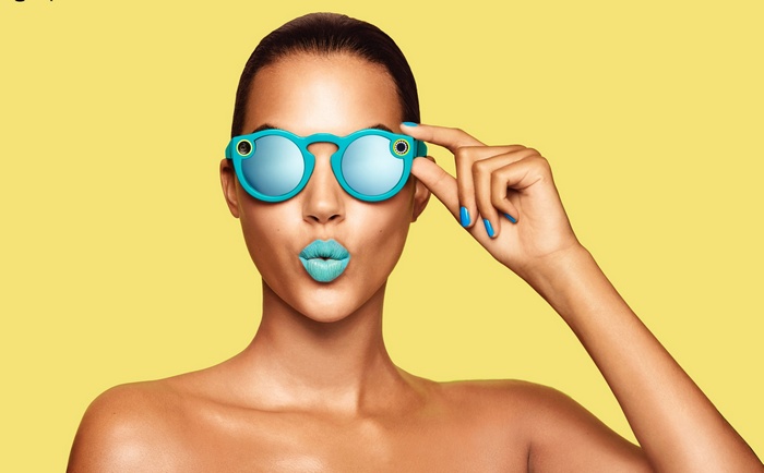 Woman wearing Snapchat Spectacles sunglasses