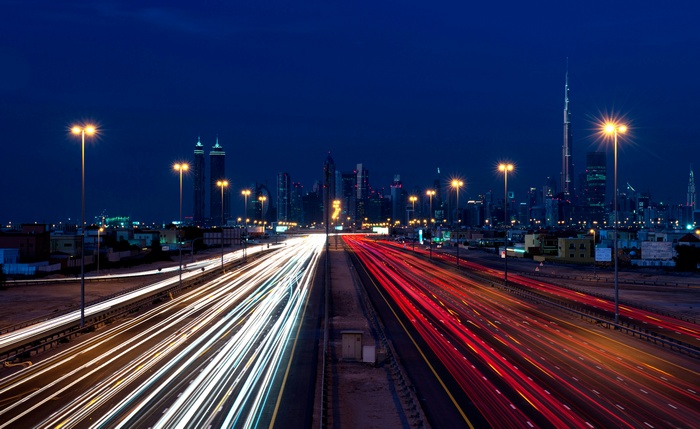 Dubai nightscape with traffic light trails
