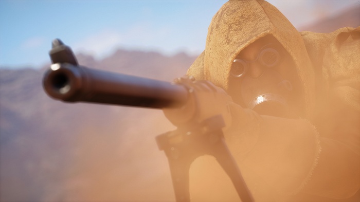 Sniper with gas mask aiming a rifle in a desert