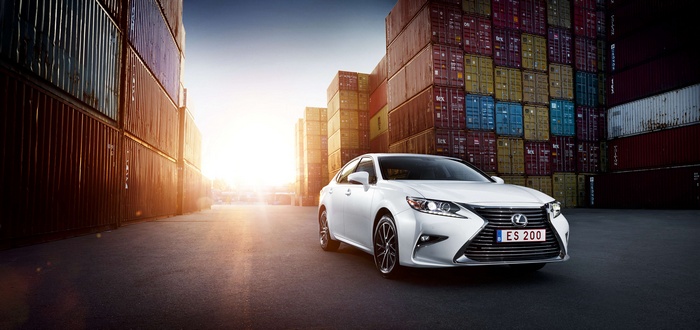White Lexus ES 200 in shipping container yard