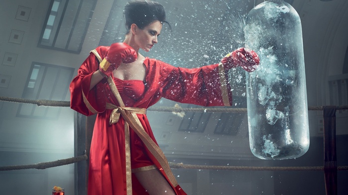 Eva Green boxing in a red robe for Campari Calendar