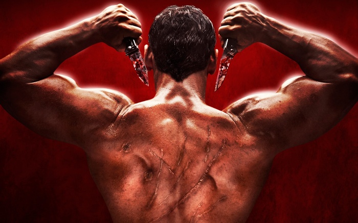 John Abraham from Rocky Handsome holding bloody knives