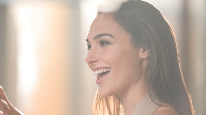 Gal Gadot smiling with bright lighting