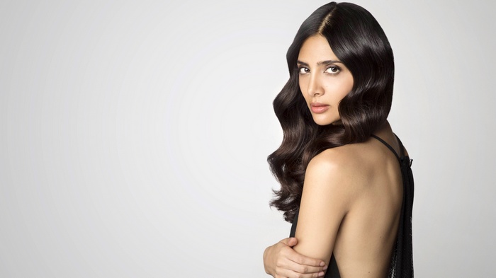 Bollywood actress with wavy dark hair