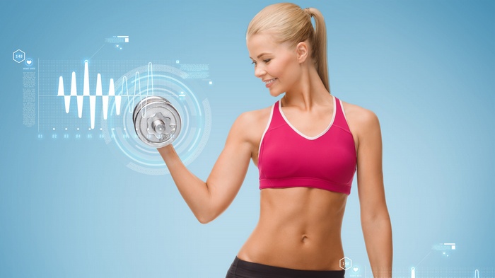 Woman lifting dumbbell with fitness data overlay