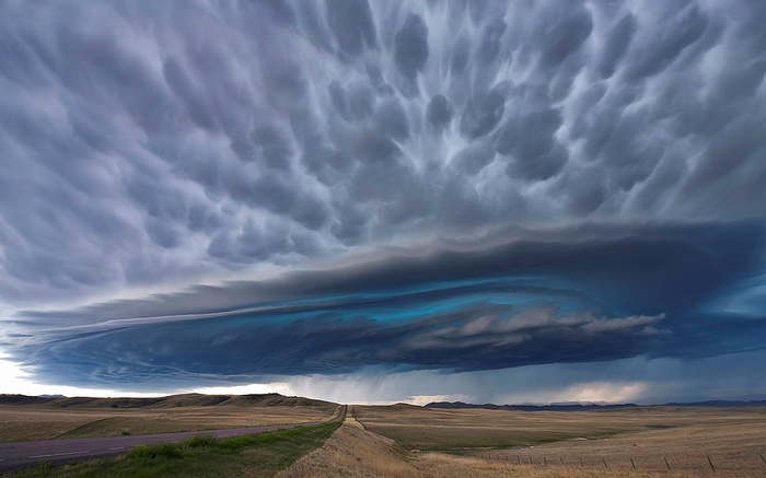 Mammatus clouds over a prairie landscape